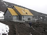 Ecuador Cotopaxi 02-07 Jose Ribas Refuge Outside Peter Ryan made it to the two-story, yellow-roofed, stone building of the Jos� Ribas Refuge.